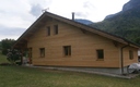 ITE laine de bois avec bardage mélèze sur chalet madrier