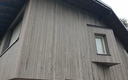 Isolation thermique en façade finition joint debout aluminium et bardage douglas pré-grisé
